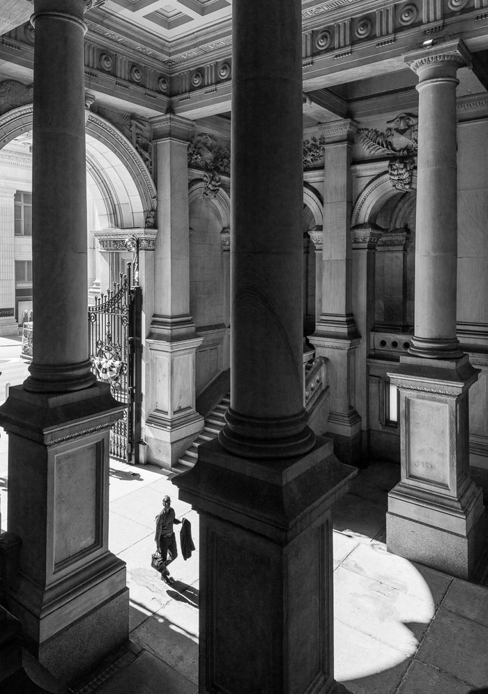 "East Portal to City Hall, Philadelphia" by James Abbott. A black and white Inkjet Print looking out through the monumental East Portal and it's intricate wrought-iron gate at Philadelphia's City Hall. The Print Center