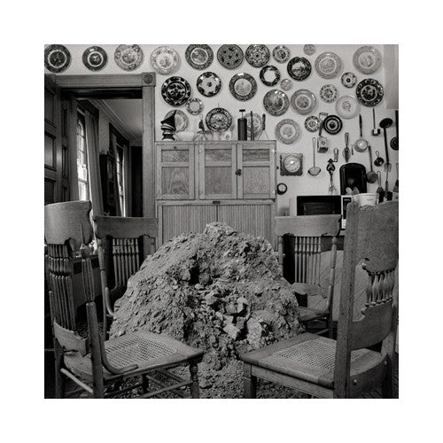 Kitchen Keith Sharo Geltain Silver Print the print center black and white kitchen chairs pile of dirt table plates hung on wall family histories
