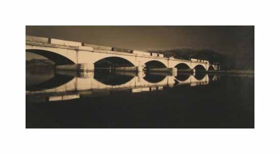 "Untitled (Rail Road Bridge, Schuylkill)" by James Abbott. A Gelatin silver print depicting a railroad bridge crossing the Schuylkill River in Philadelphia. Landscape, Black and White, Photograph. The Print Center