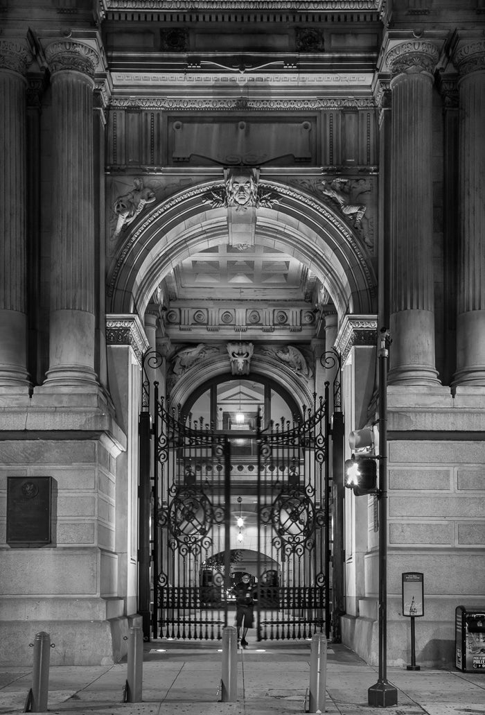 "East Portal to City Hall, Philadelphia" by James Abbott. An Inkjet Print depicting the intricate wrought-iron gate surrounded by the monumental archway leading into the interior courtyard of Philadelphia's City Hall. The Print Center